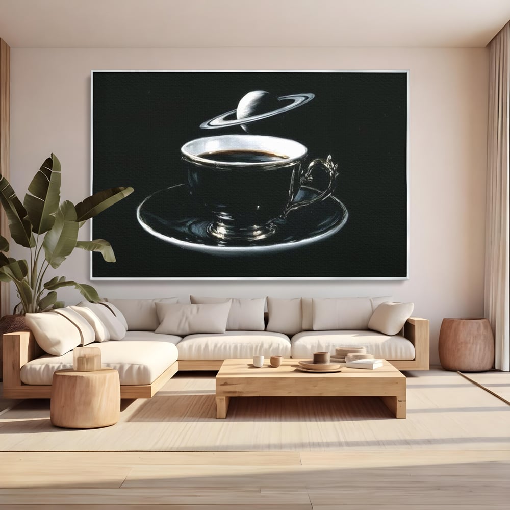 Tablou canvas cu tablou canvas cu ceasca de cafea si planeta, in rama de aluminiu argintiu, pe perete intr-un living